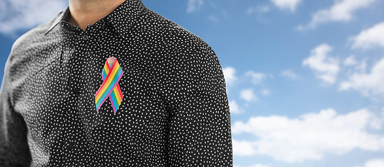 Image showing man with gay pride rainbow awareness ribbon