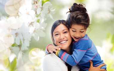 Image showing happy mother and daughter hugging