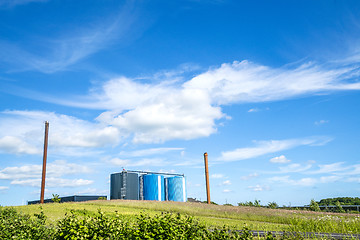 Image showing Industrial factory with large silos in blue colors