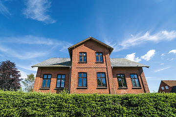 Image showing Large brick house in red color