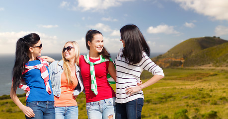 Image showing teenage girls or young women over big sur coast