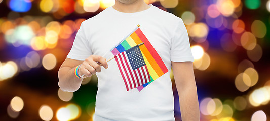 Image showing man with gay pride rainbow flag and wristband