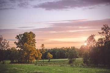 Image showing Sunset in a countryside landscape