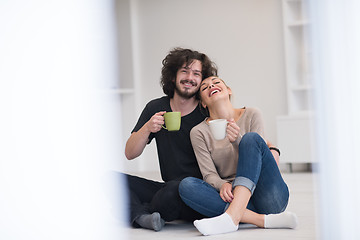 Image showing young couple in their new home