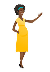 Image showing African pregnant woman showing a direction.