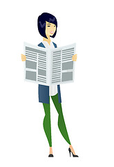 Image showing Business woman reading newspaper.