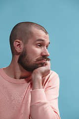 Image showing Beautiful bored man bored isolated on blue background