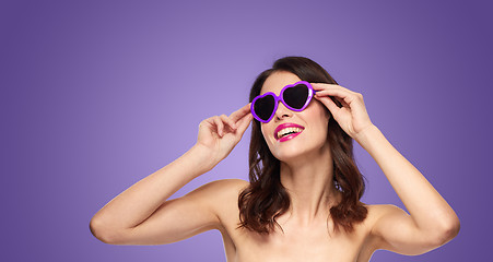 Image showing woman with pink lipstick and heart shaped shades