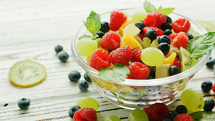 Image showing Bowl with berries and fruit