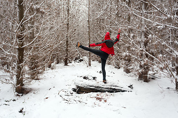 Image showing Stretching outdoors in the snow