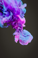 Image showing a colorful blue pink ink splash in water