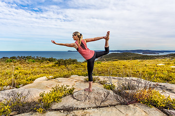 Image showing Yoga, Natarajasana, or Lord of the Dance among wildflowers