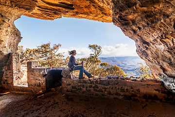 Image showing Cave chilling cliff side views for miles, travel tourism