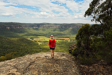 Image showing Taking in the magnificent views of valley and mountain escarpmen