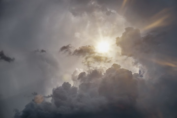 Image showing dramatic grey sky with sun