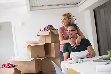 Image showing Young couple moving in a new home