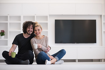 Image showing young couple in their new home