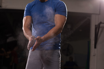 Image showing Gym Chalk Magnesium Carbonate hands clapping man