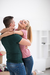 Image showing happy Young couple moving in new house