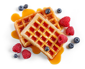 Image showing waffles decorated with honey and berries