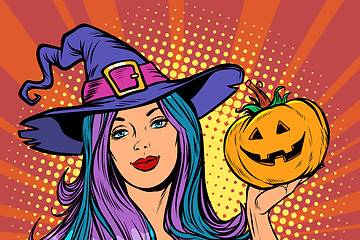 Image showing happy Halloween witch with pumpkin