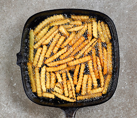 Image showing fried potatoes in frying pan