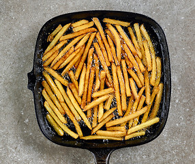 Image showing fried potatoes in frying pan