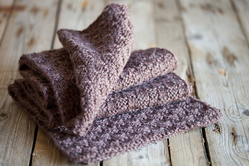 Image showing Brown knitted wooden scarf