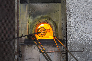 Image showing Manufacturing glass in a traditional oven, in glass factory in M