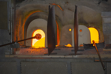 Image showing Manufacturing glass in a traditional oven, in glass factory in M