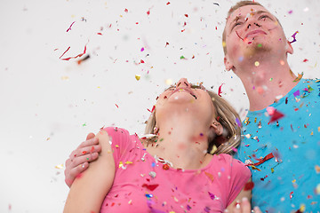 Image showing romantic young  couple celebrating  party with confetti