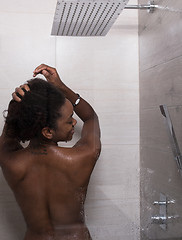 Image showing African American woman in the shower