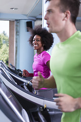 Image showing people exercisinng a cardio on treadmill in gym