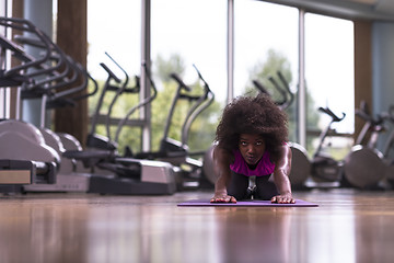 Image showing african american woman exercise yoga in gym