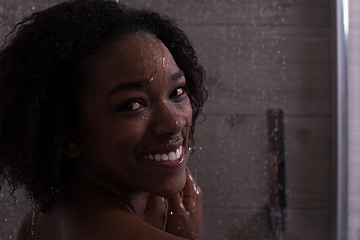 Image showing African American woman in the shower