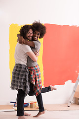 Image showing Young happy multiethnic couple hugging