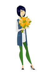 Image showing Asian business woman holding a bouquet of flowers.