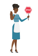 Image showing African cleaner holding stop road sign.