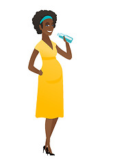 Image showing Young african pregnant woman drinking water.