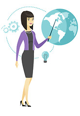 Image showing Asian business woman pointing at a globe.