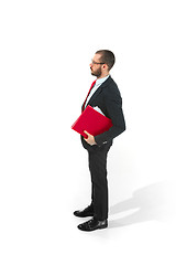 Image showing Full body portrait of businessman with folder on white