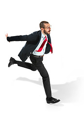 Image showing Businessman running with a folder on white background