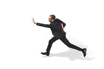 Image showing Businessman running with a folder on white background