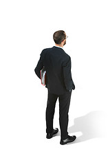 Image showing Full body portrait of businessman with folder on white