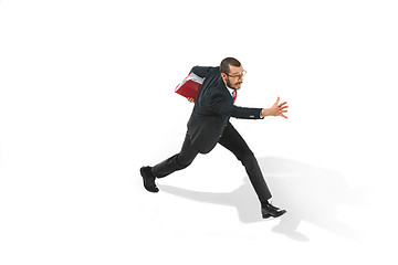 Image showing Businessman running with a folder on white background