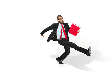 Image showing Businessman running with a folder on white background