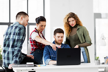 Image showing creative team with laptop working at office