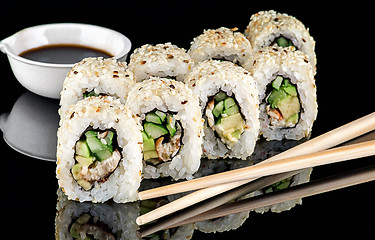 Image showing Several pieces of sushi roll california