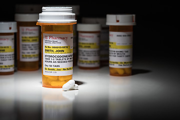 Image showing Hydrocodone Pills and Prescription Bottles with Non Proprietary 