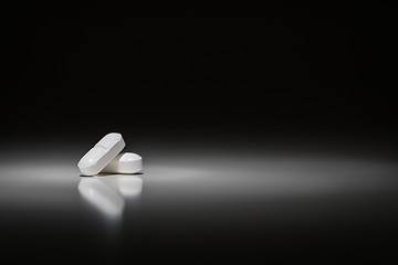 Image showing Hydrocodone Prescription Pills Under Spot Light.